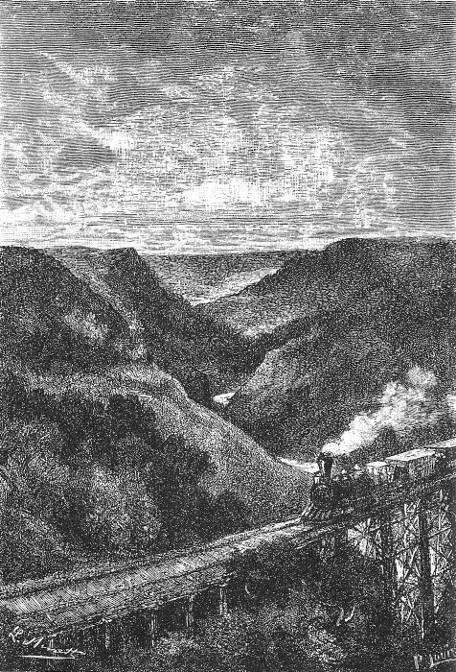 
Le rail-road atteignait le plus haut point de son parcours.