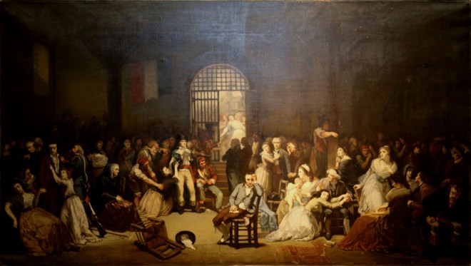 Appeal of the last victims of terror in the prison of St. Lazarus, 7, 9 Thermidor 1794. Chénier appears seated at the foreground's center. Painting by Charles Louis Müller